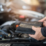 Inspecting engine air filter as part of a Land Rover service schedule